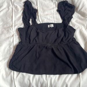 This is a black top from Hollister. It has flowy/flappy straps!